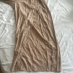 Jumpsuit xẻ đùi 1005499