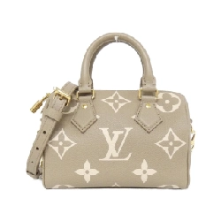Túi xách Boston Louis Vuitton Monogram Bicolor Empreinte Speedy Bandoulière 20cm M46575