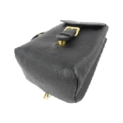 Ba lô Tiny Monogram Empreinte Louis Vuitton M80596 609405