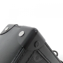 Túi xách vai Louis Vuitton Monogram Eclipse Vertical Trunk Wearable Wallet M82077 613316