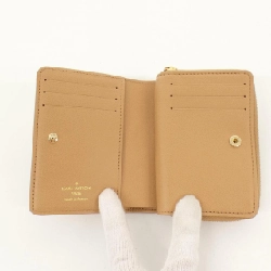 Ví Louis Vuitton Kusson Portefeuille Rue M81673 622005