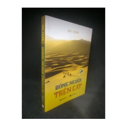 Bóng người trên cát