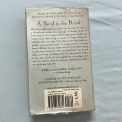 Sách ngoại văn- A bend in the road 568729