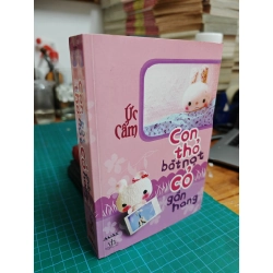 Con thỏ bắt nạt cỏ gần hang 494103
