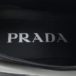 Giày lười Monolis Triangle Logo PRADA 1D649M - Hàng hiệu Authentic 827971