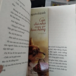 Cuốn sách  "Con chó nhỏ mang giỏ hoa hồng" của tác giả Nguyễn Nhật Ánh. 546358