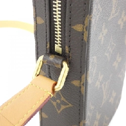 Túi xách mini Louis Vuitton Monogram Music Player Wearable Wallet M14063 - Hàng hiệu Chính hãng 767950
