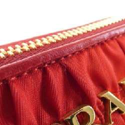 Túi đeo vai Prada 1BH152 612301