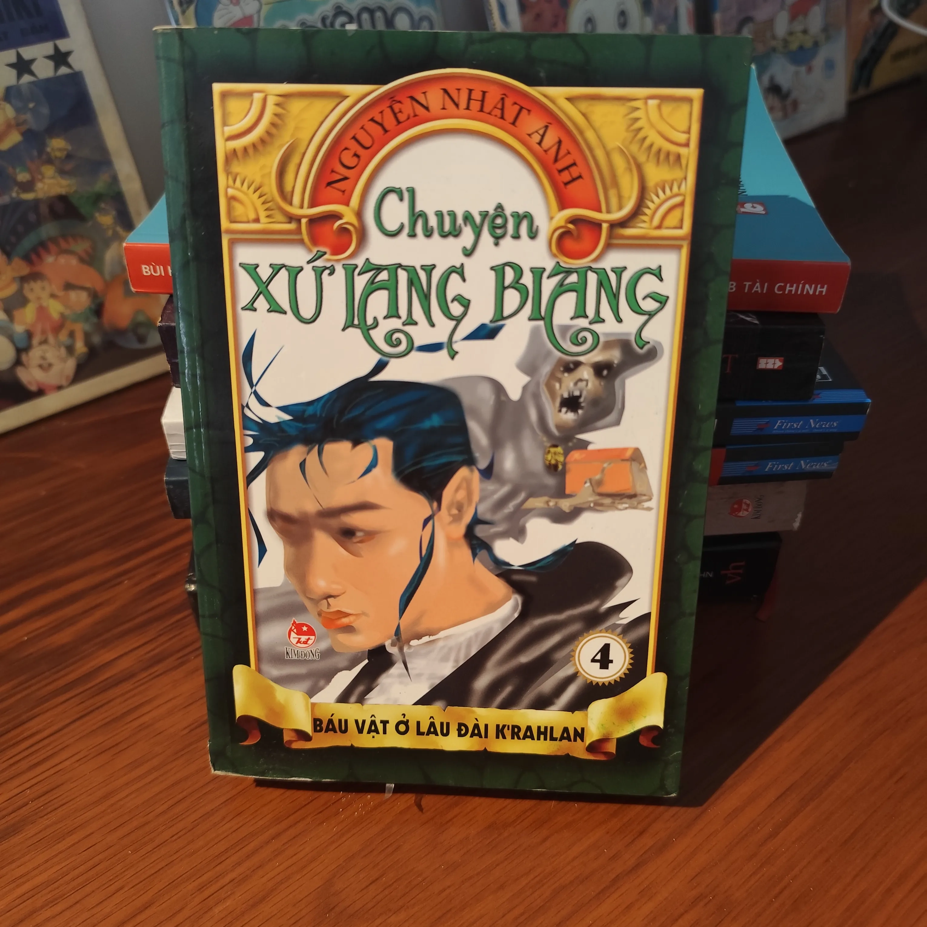 "Chuyện xứ Lang Biang - Tập 4: Báu Vật Ở Lâu Đài K'rahlan" by  - Sách Book Cover - Ngọc Hiển Books
