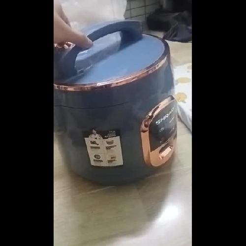 Nồi cơm điện SHRAP màu xanh, thể tích 2,2 lít , tình trạng chưa từng sử dụng