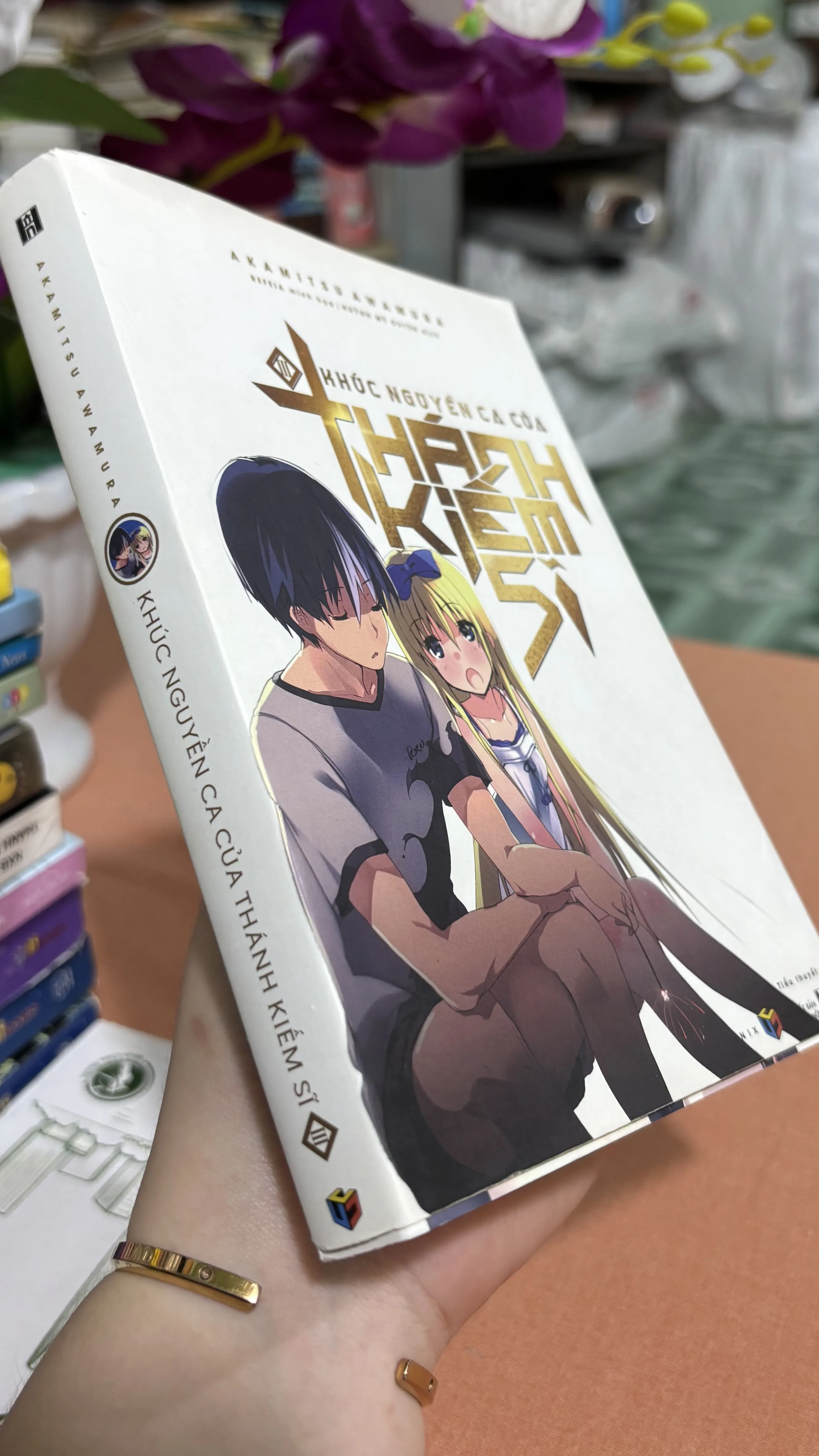 Khúc nguyền ca của thánh kiếm sĩ tập 3 🌊 by  - Sách Book Cover - Ngọc Hiển Books