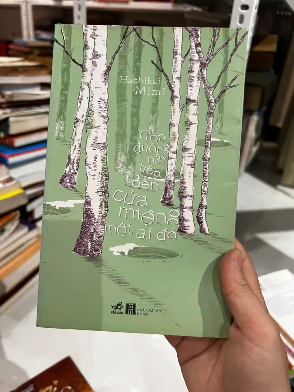 Con đường này tiếp đến cửa miệng của ai đó ⭐ by  - Sách Book Cover - Ngọc Hiển Books