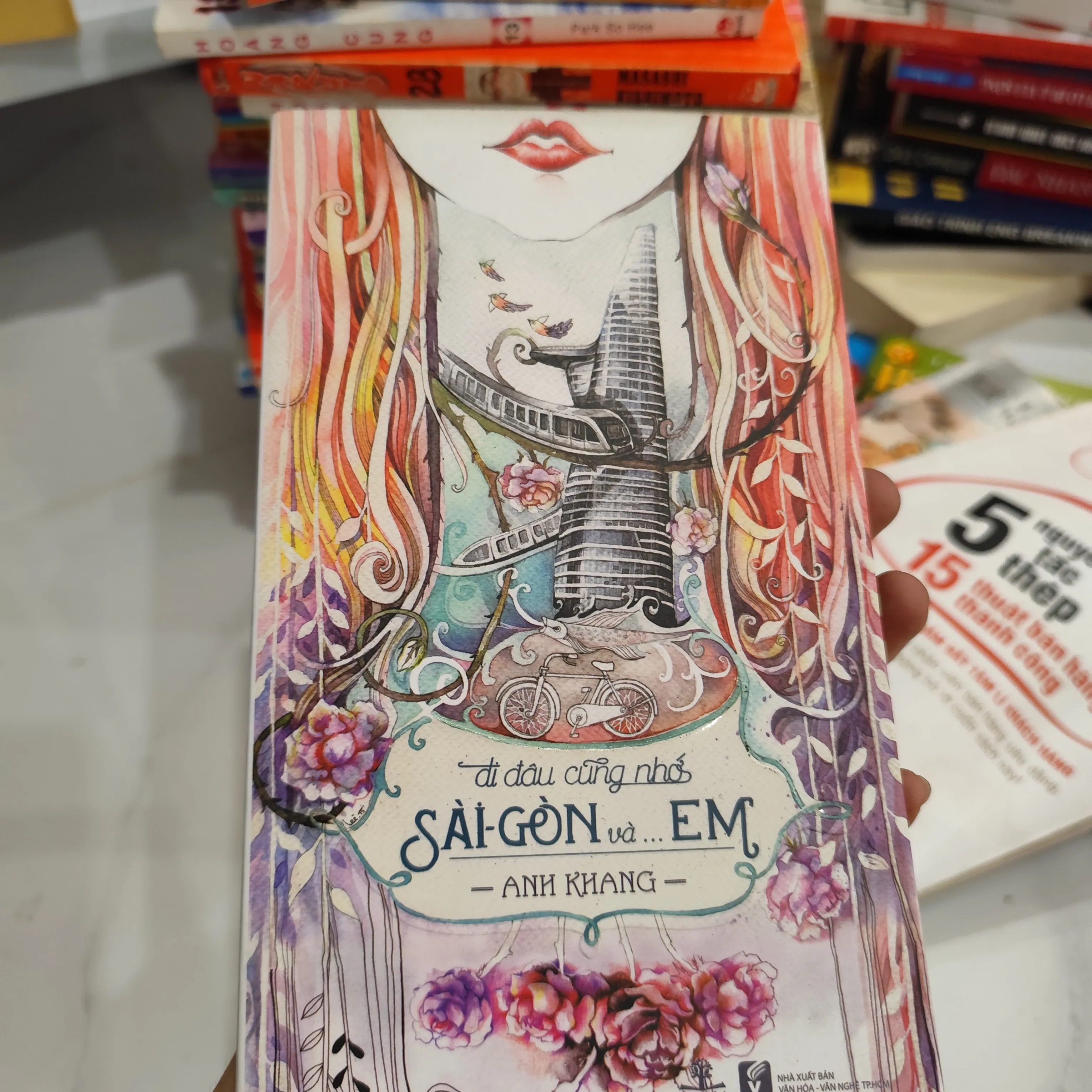 Đi đâu cũng nhớ Sài Gòn và... em" của tác giả Anh Khang. by  - Sách Book Cover - Ngọc Hiển Books