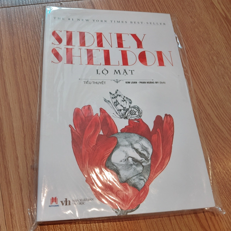 Lộ mặt - Sidney Sheldon 525934