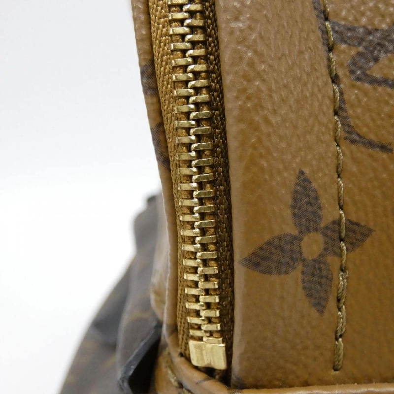 Ba lô Louis Vuitton Monogram Reverse Palm Springs MINI M44872 609266