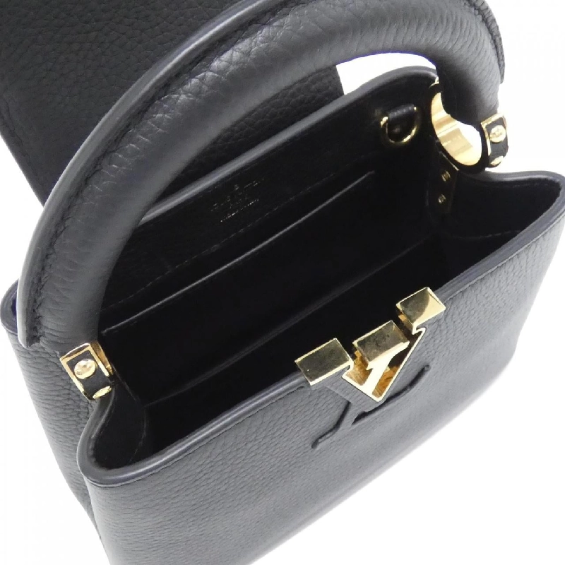 Túi Louis Vuitton Capucines MINI M56071 614385
