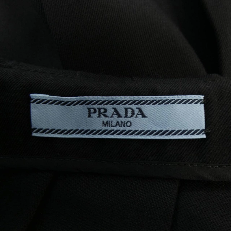 Chân váy logo tam giác PRADA P123UE S221 155E 649254