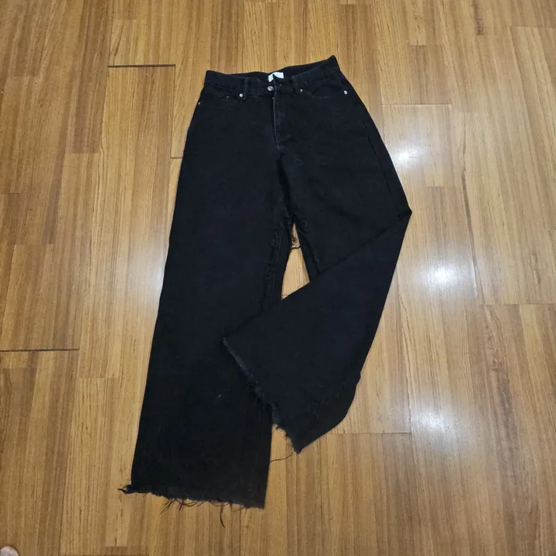 Quần jeans đen ống rộng 1031658