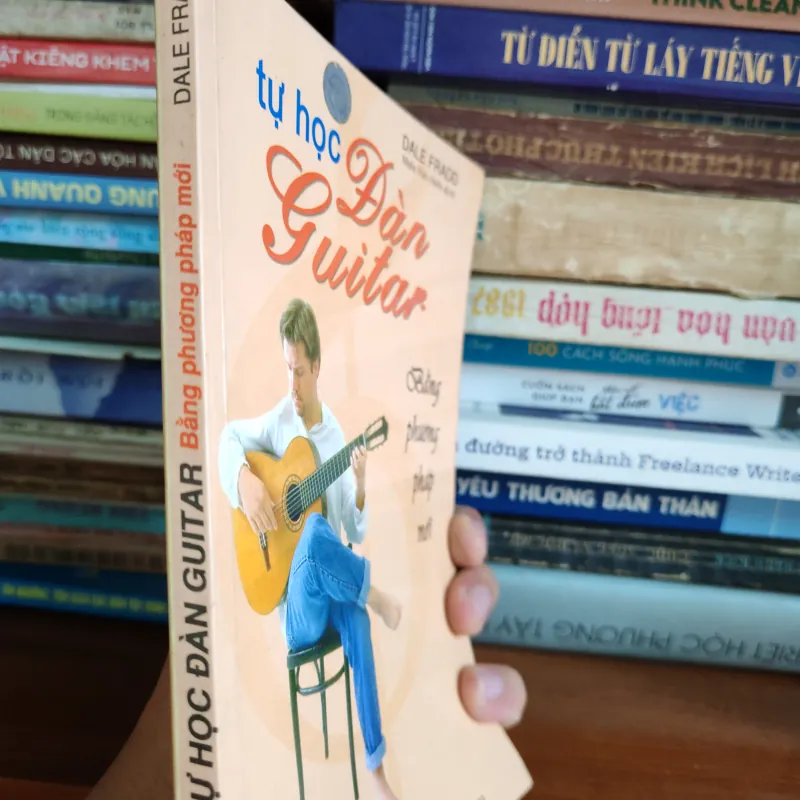 Tự học đàn guitar bằng phương pháp mới 1040157