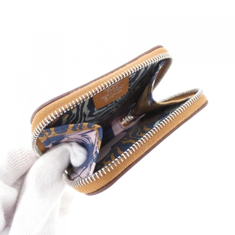 Ví tiền Hermes WILD Silk in Port Monet 084716CK 621538