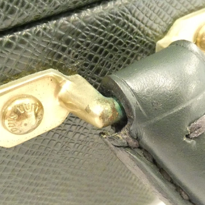 Túi Louis Vuitton Taiga President M30004 617378