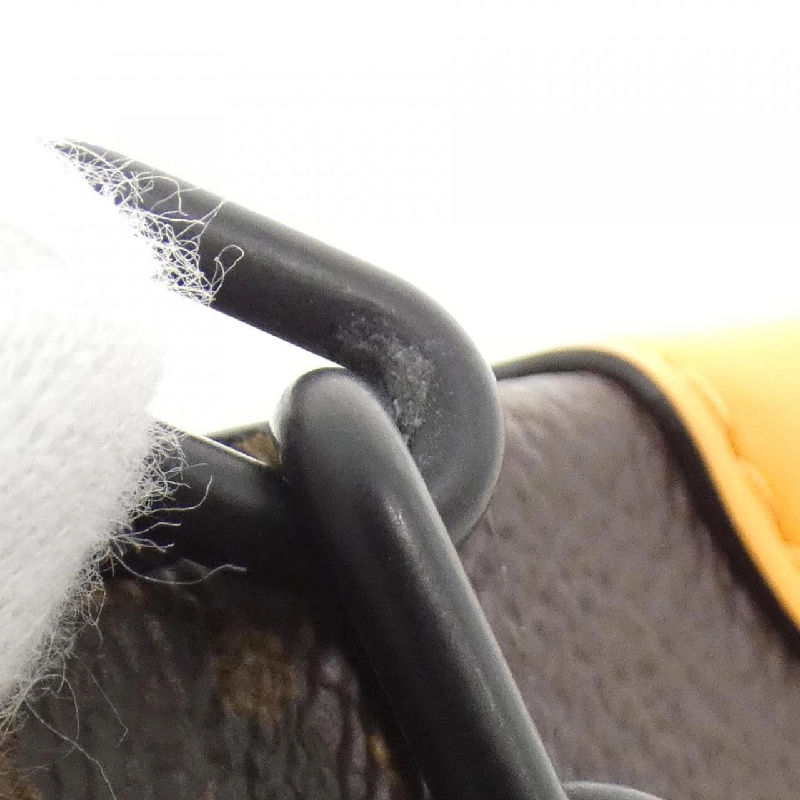 Túi đeo vai Louis Vuitton Monogram Macassar Steamer Wearable Wallet M82534 613610