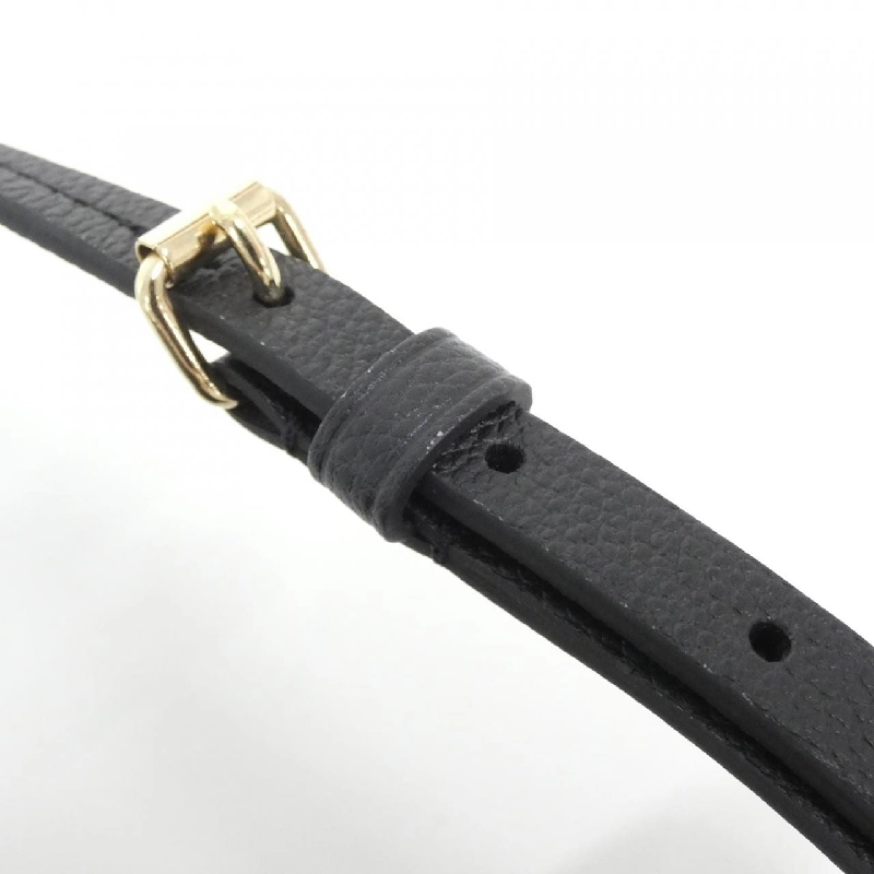 Ba lô Tiny Monogram Empreinte Louis Vuitton M80596 611183