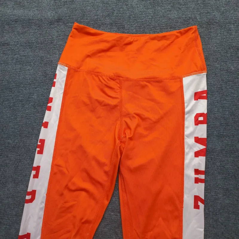 Quần thể thao dài tập thể dục màu cam 933369