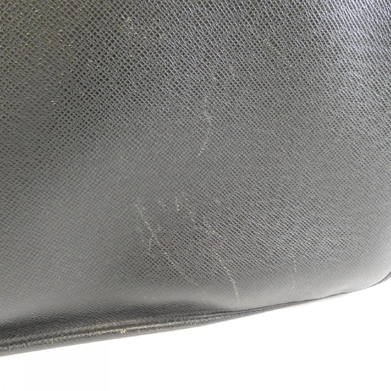 Túi xách vai Louis Vuitton Taiga Andre M32482 609664