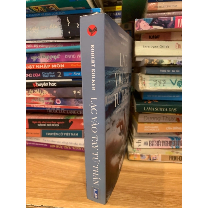 Lạc vào tay tử thần -Robert Kolked 786133