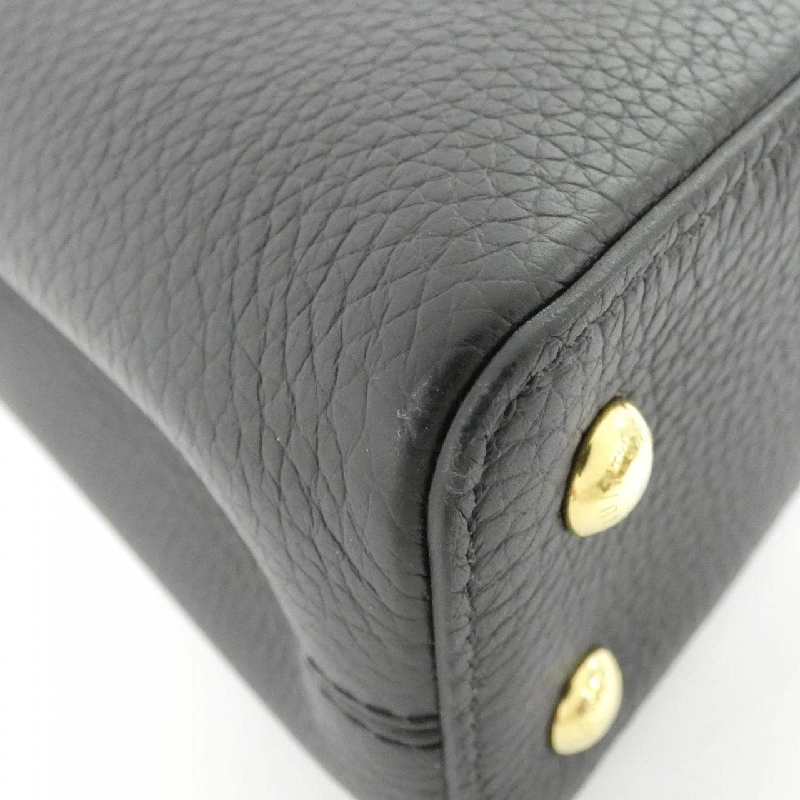 Túi Louis Vuitton Capucines MINI M56071 619797