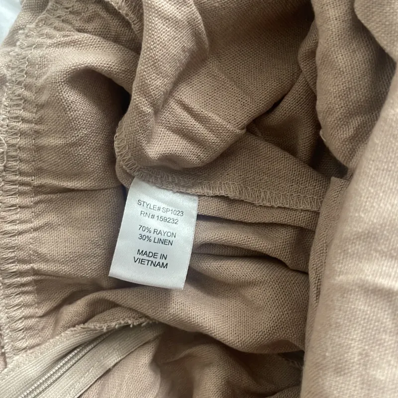 Jumpsuit xẻ đùi 1005499