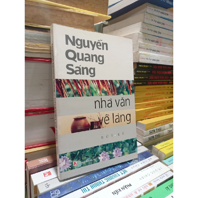 Nhà văn về làng - Nguyễn Quang Sáng 184780