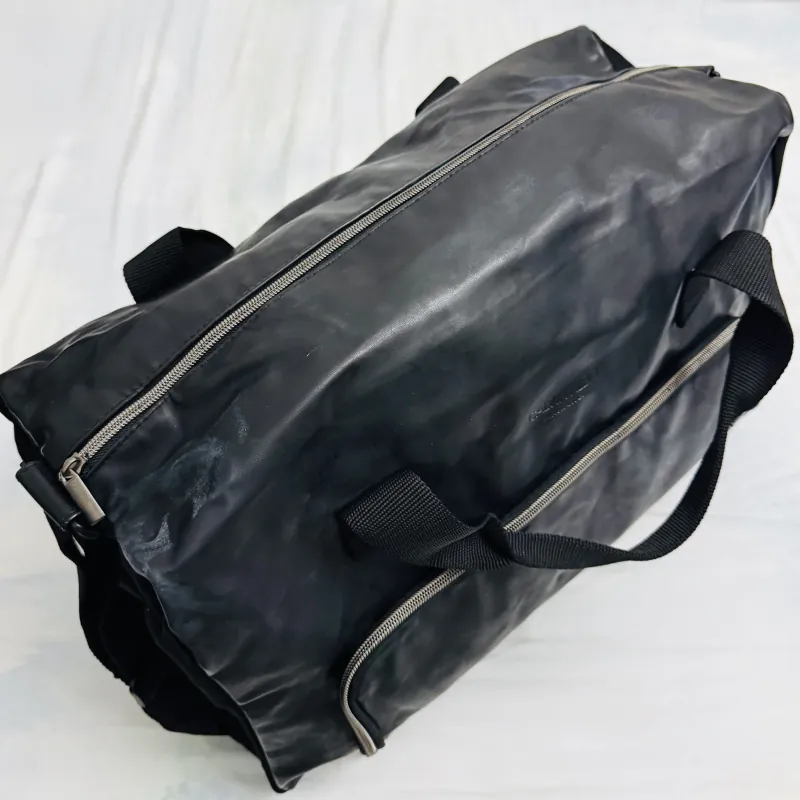 Túi chữ nhật CK màu đen, cond 90%, 150K 925362