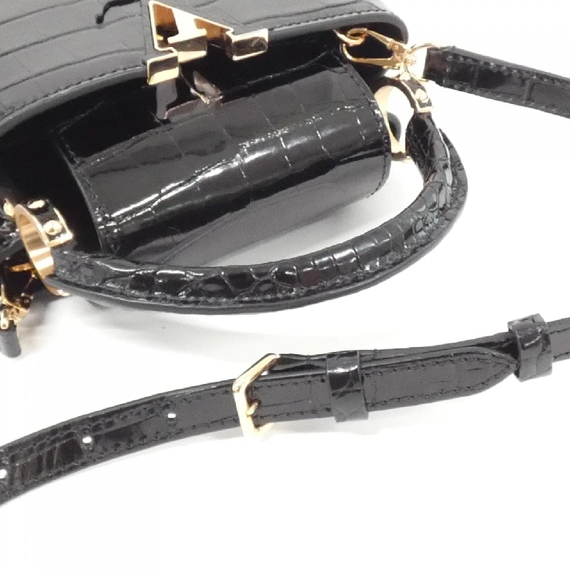 Túi xách Louis Vuitton Exotic Leather Capucines MINI P01131 618109