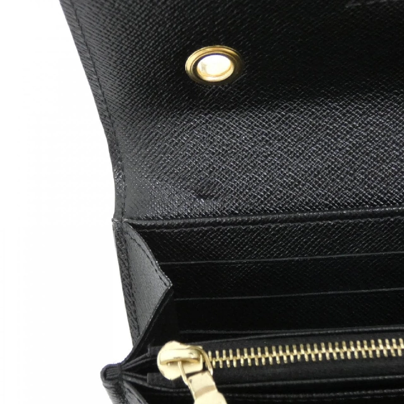 Ví Louis Vuitton Epi Portefeuille Twist M62483 621624