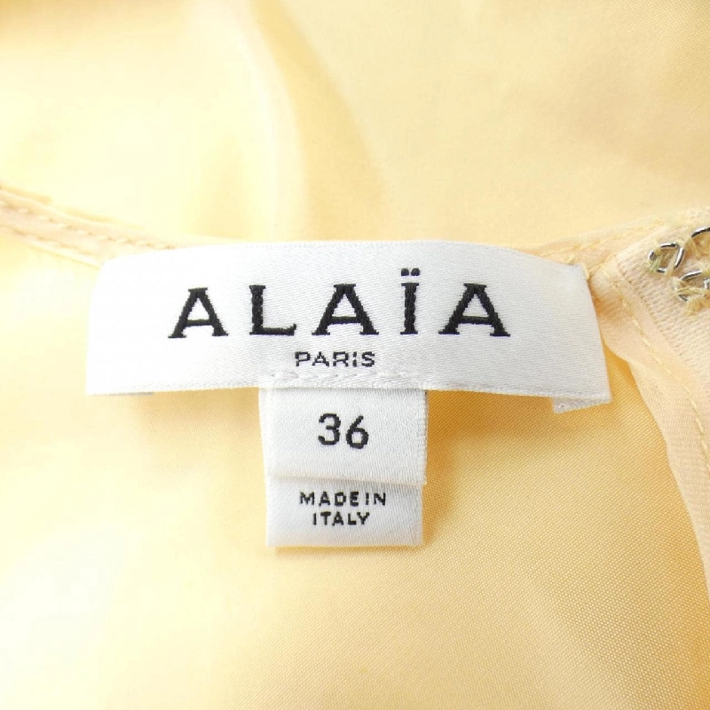 Áo ALAIA AA9H1193W039A - Hàng hiệu Authentic 814600