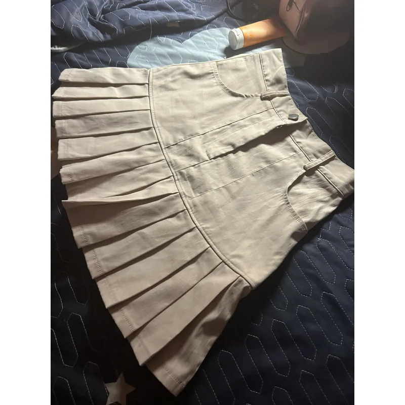 Chân váy xếp ly màu be  707097