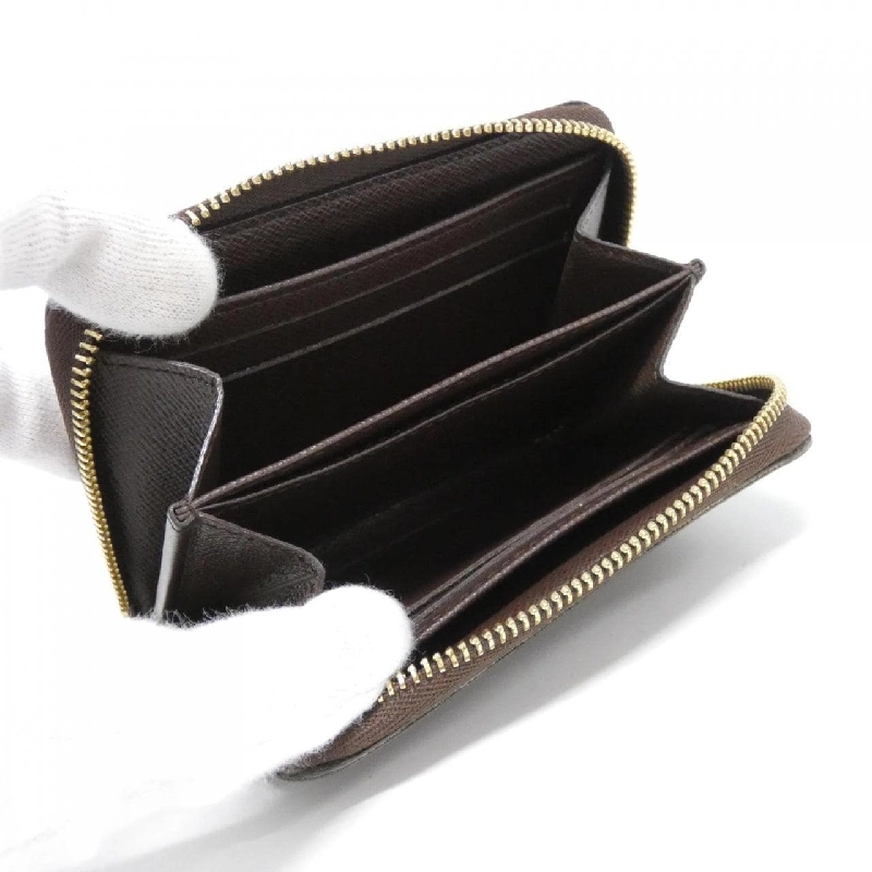 Ví tiền xu Louis Vuitton Damier Zippy N63070 620649