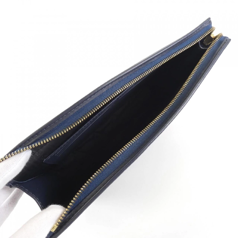 Túi xách Louis Vuitton Monogram Drip Pochette Voyage M45961 619942