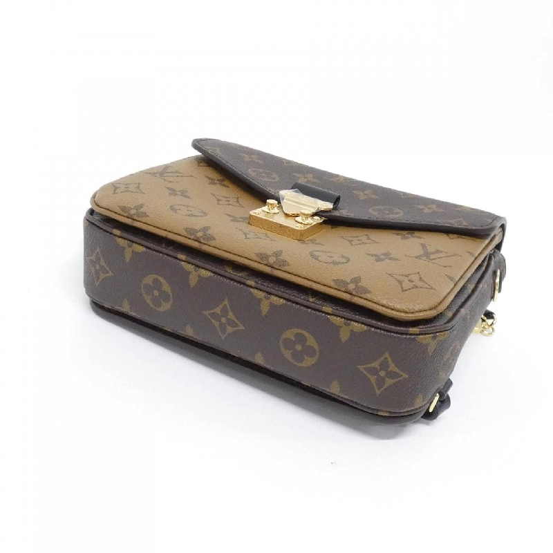Balo Louis Vuitton Monogram Reverse Pochette Metis M11941 609731