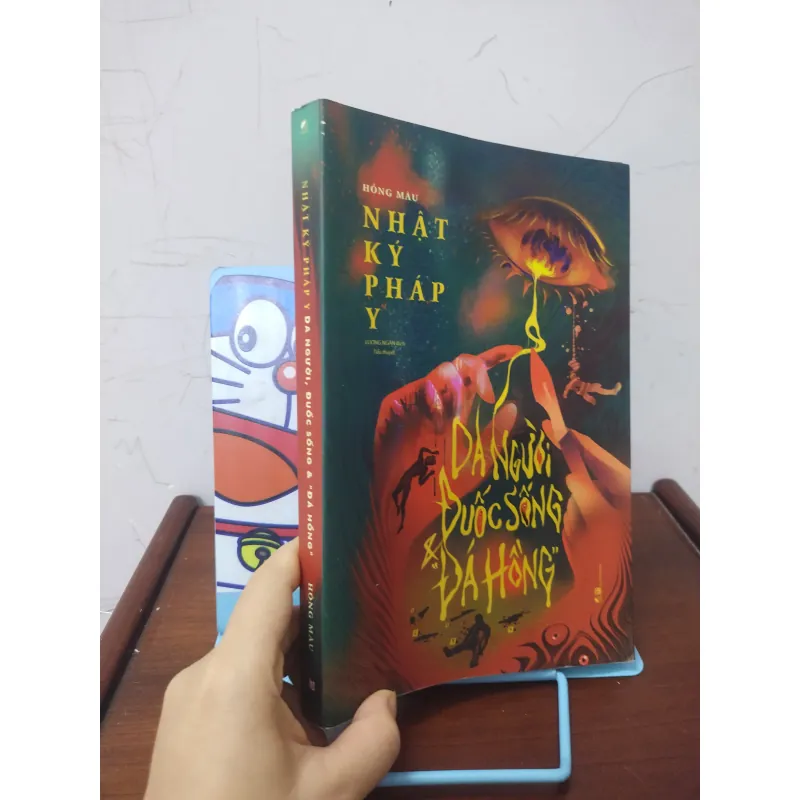Sách: Nhật ký Pháp y - Da người, đuốc sống & Đá hồng - TG: Hồng Mâu 976597
