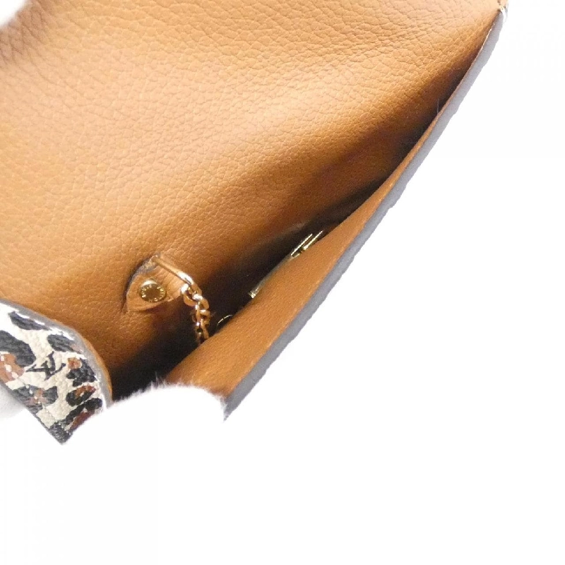 Túi đeo chéo Louis Vuitton Monogram Empreinte (Wild at Heart) Pochette Clé M80692 - Hàng hiệu Authentic 806065