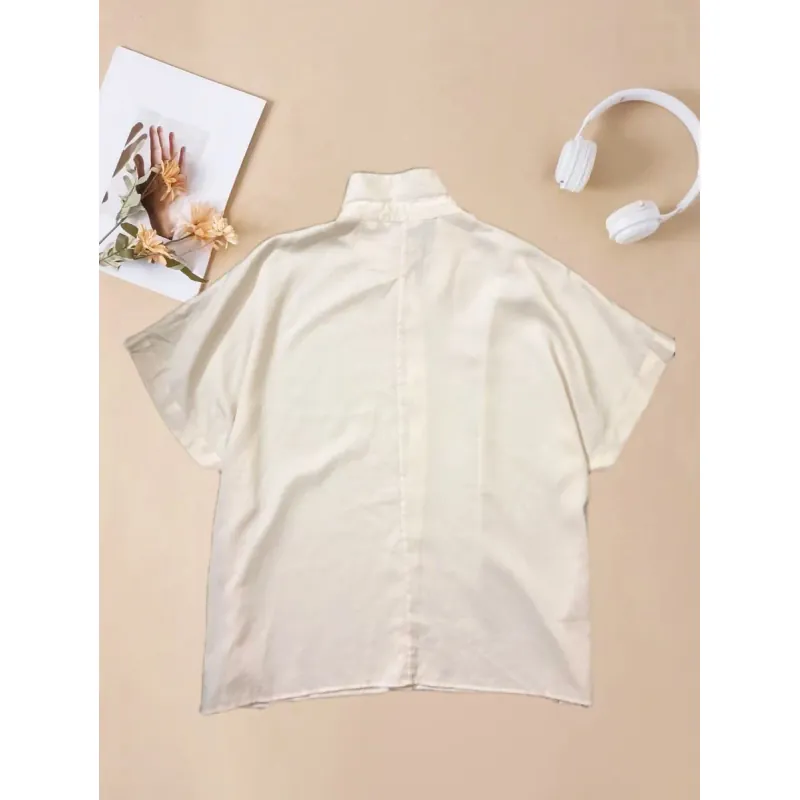 Áo sơmi hiệu Uniqlo màu kem  791326