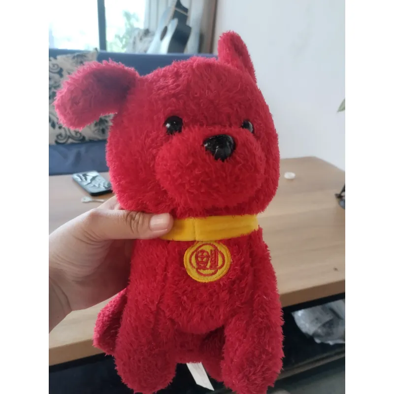 một con thú nhồi bông hình chú chó màu đỏ. Hàng 2hand 996565