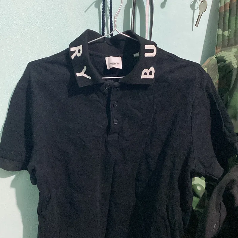 Áo Polo Burberry Size L màu đen  714039