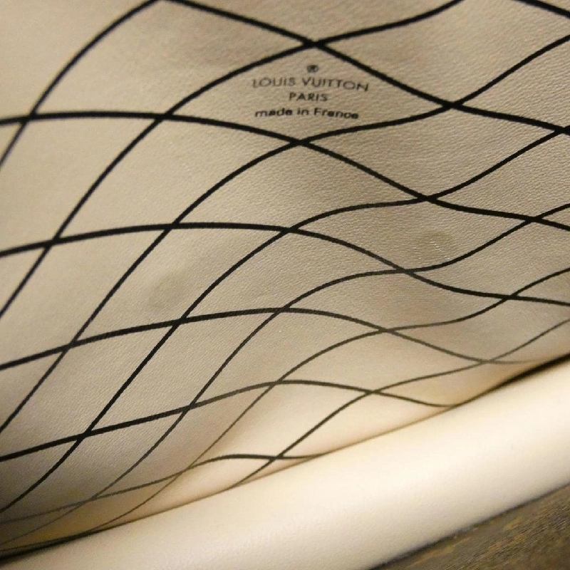 Túi xách đeo vai Louis Vuitton Monogram Reverse Trunk Clutch M43596 611712