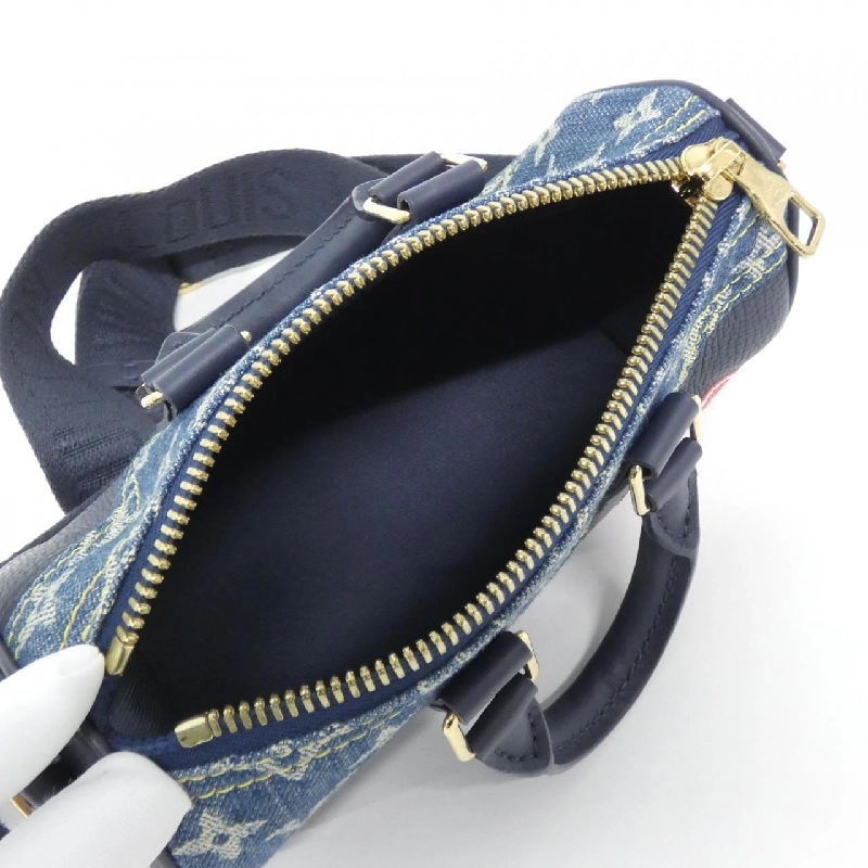 Túi Boston Louis Vuitton Monogram Drip Keepall XS M81011 614444