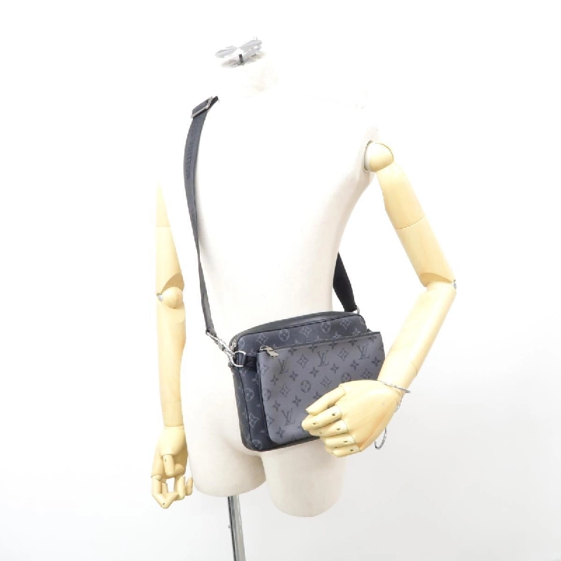 Túi xách Louis Vuitton Monogram Eclipse Reverse Trio Messenger M69443 - Hàng hiệu Authentic 769093