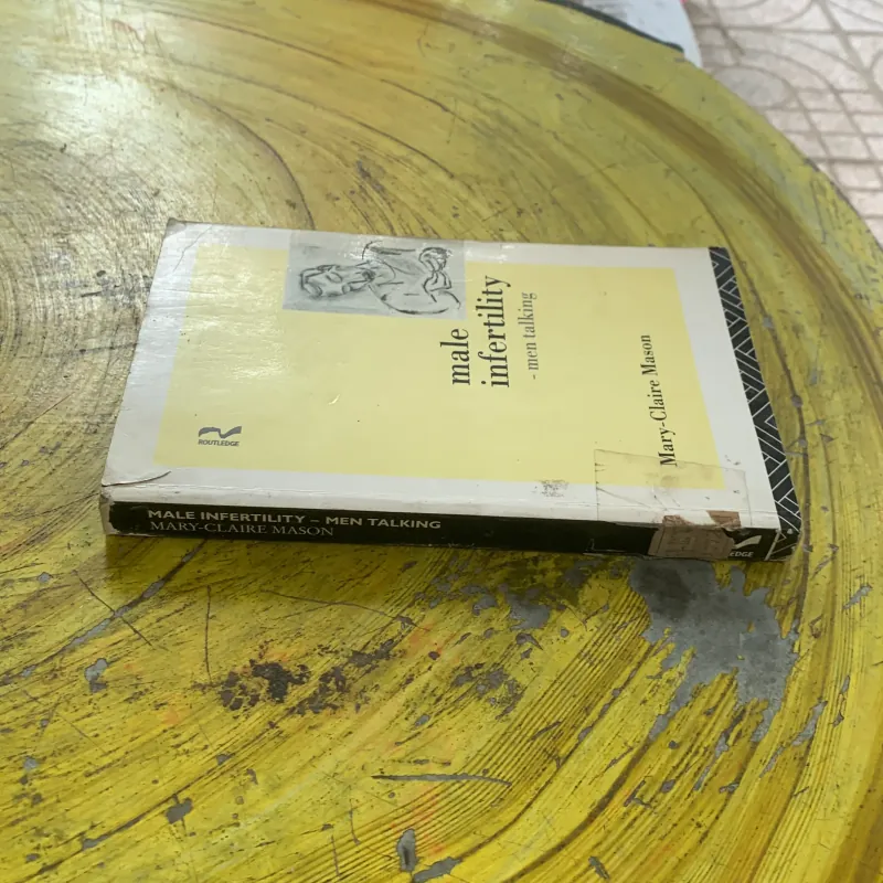 MALE INFERTILITY- men talking- MARY-CLAIRE MASON 1022734